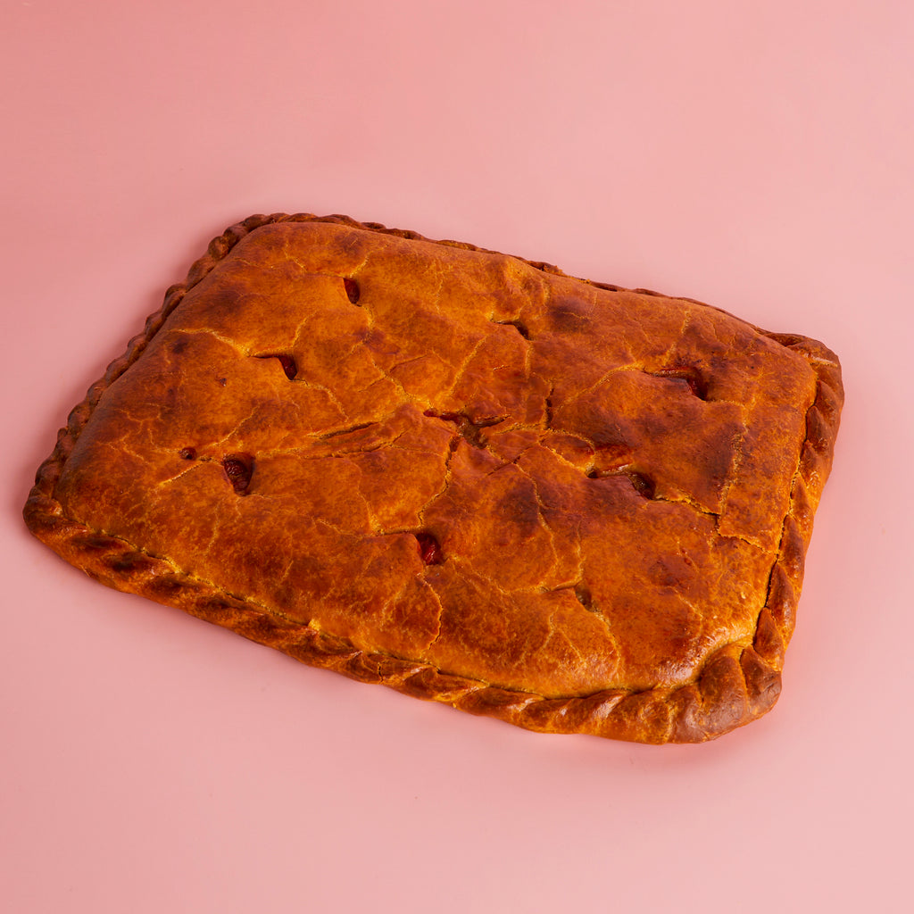 Empanada gallega de bonito, cebolla y pimiento asado